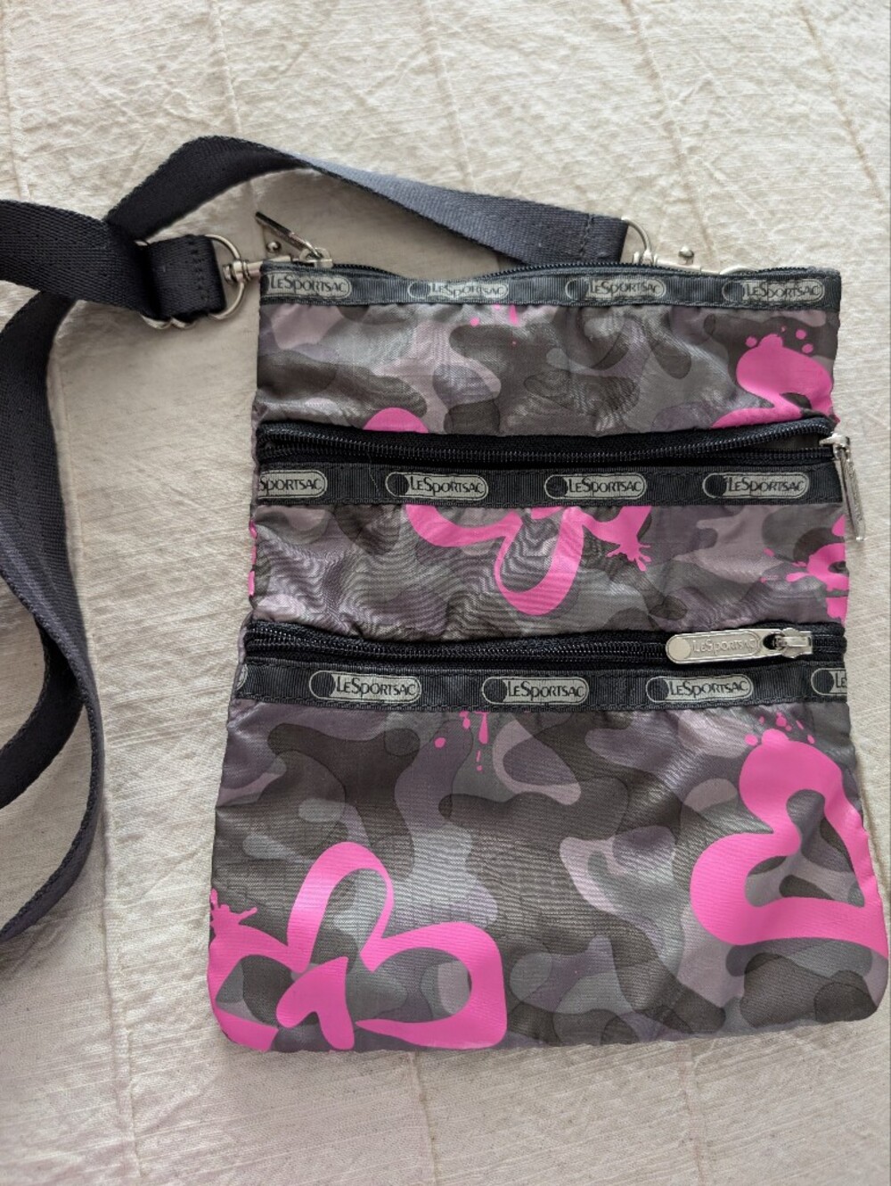 Lesportsac Gray Camouflage Crossbody Bag with Bright Pink Accents / Extra Pouch.